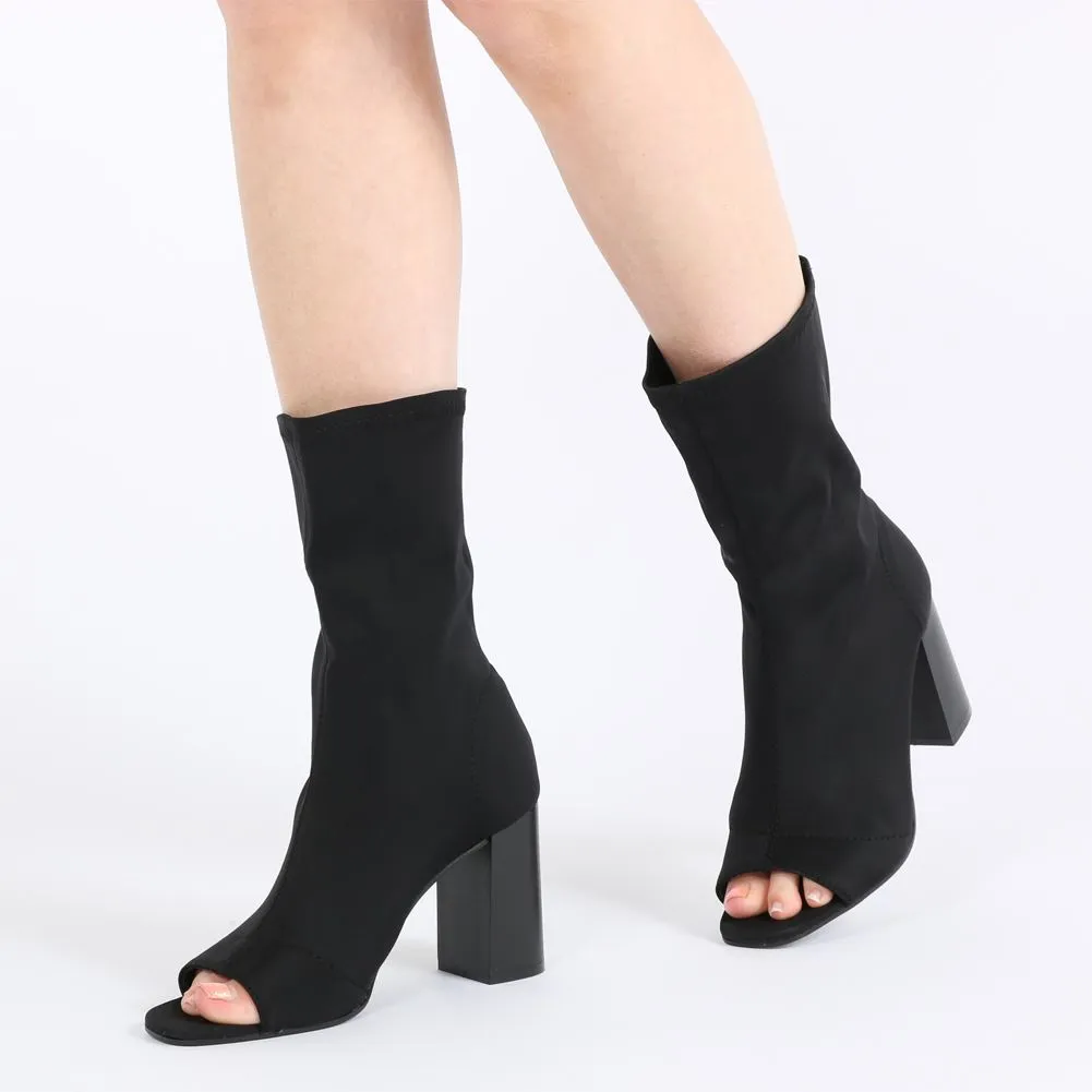 Yasmin Peeptoe Sock Fit Ankle Boots in Black Stretch