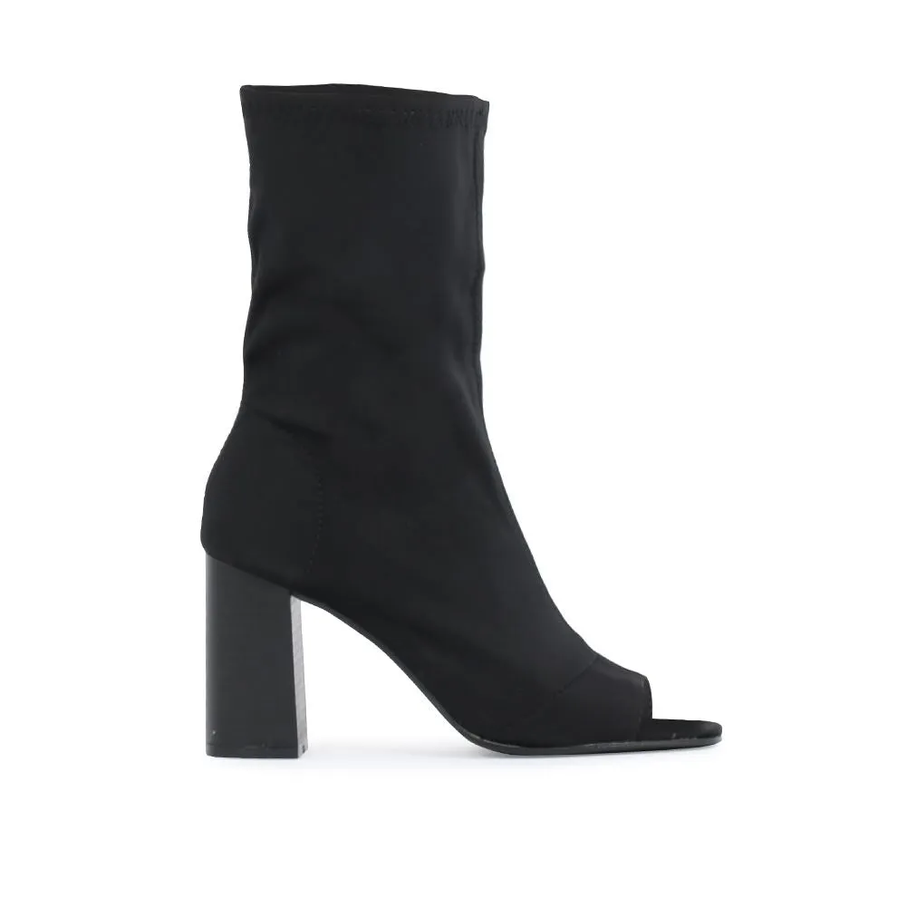 Yasmin Peeptoe Sock Fit Ankle Boots in Black Stretch